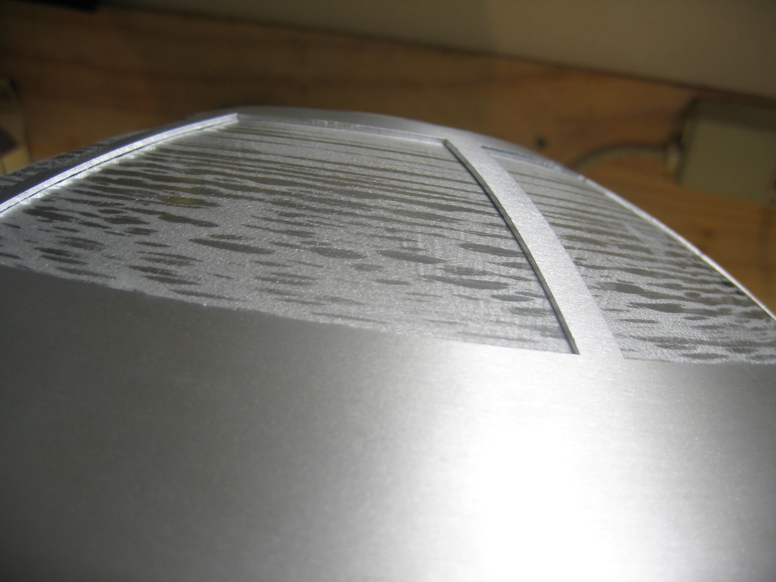 Top of the dome touching the pie edge fine, but there's a gap along the edge and bottom that needs fixing. More sanding.